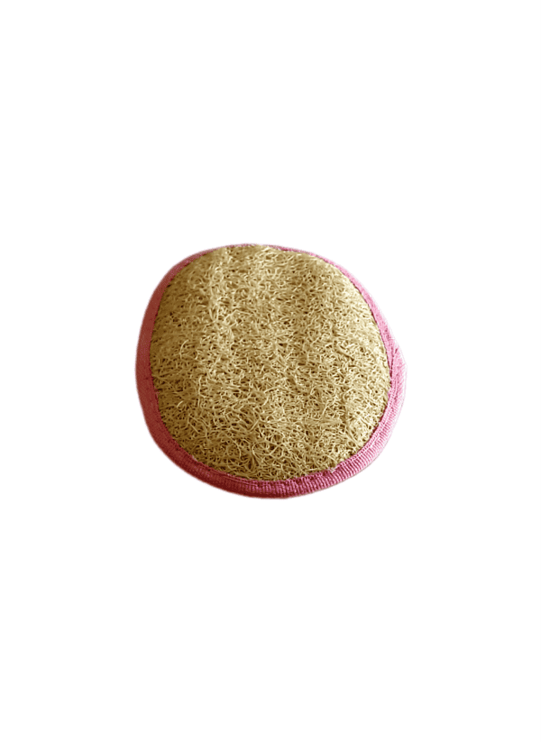 Une paumette de couleur rose face loofah.